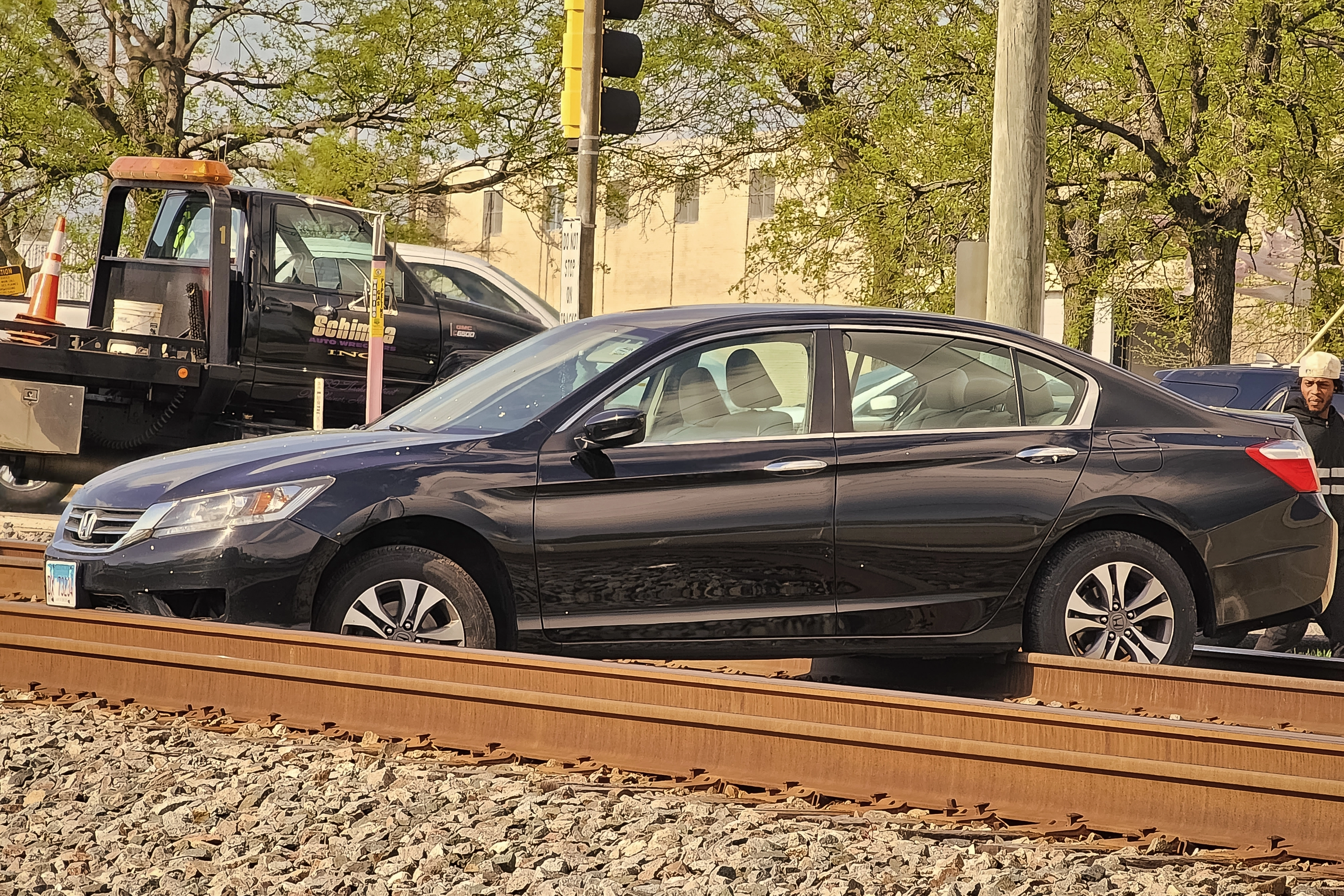 Symbolic image of VTL 1170(c)(2): driving through a railroad barrier causing physical injury.